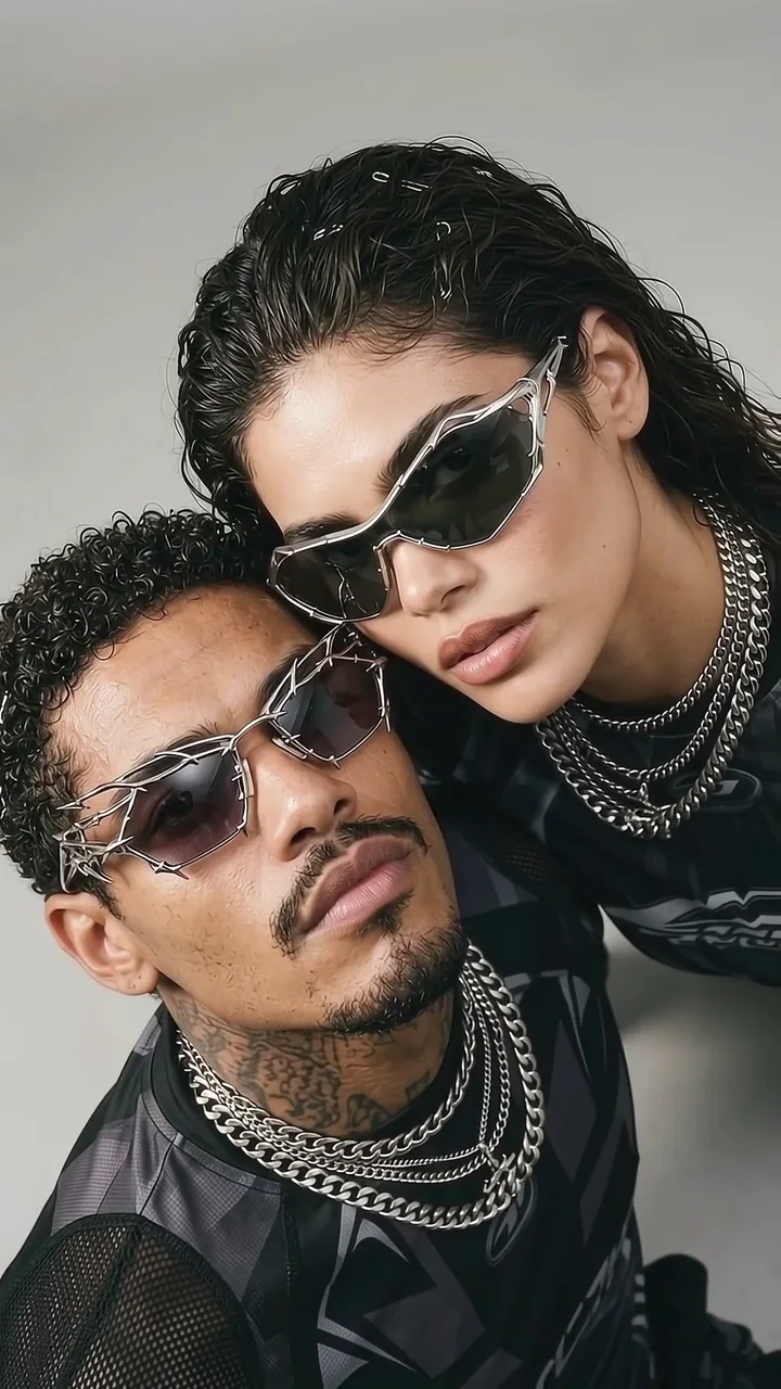 Full vertical frame from the BRVTL film showing two campaign characters in eyewear